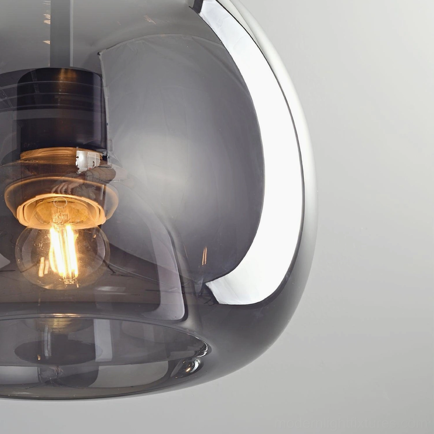 Sedona pendant light fixture showing suspension wire and adjustable height capability
