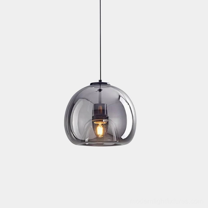Sedona single smoked glass pendant light with black cord and exposed filament, modern minimalist design on white background