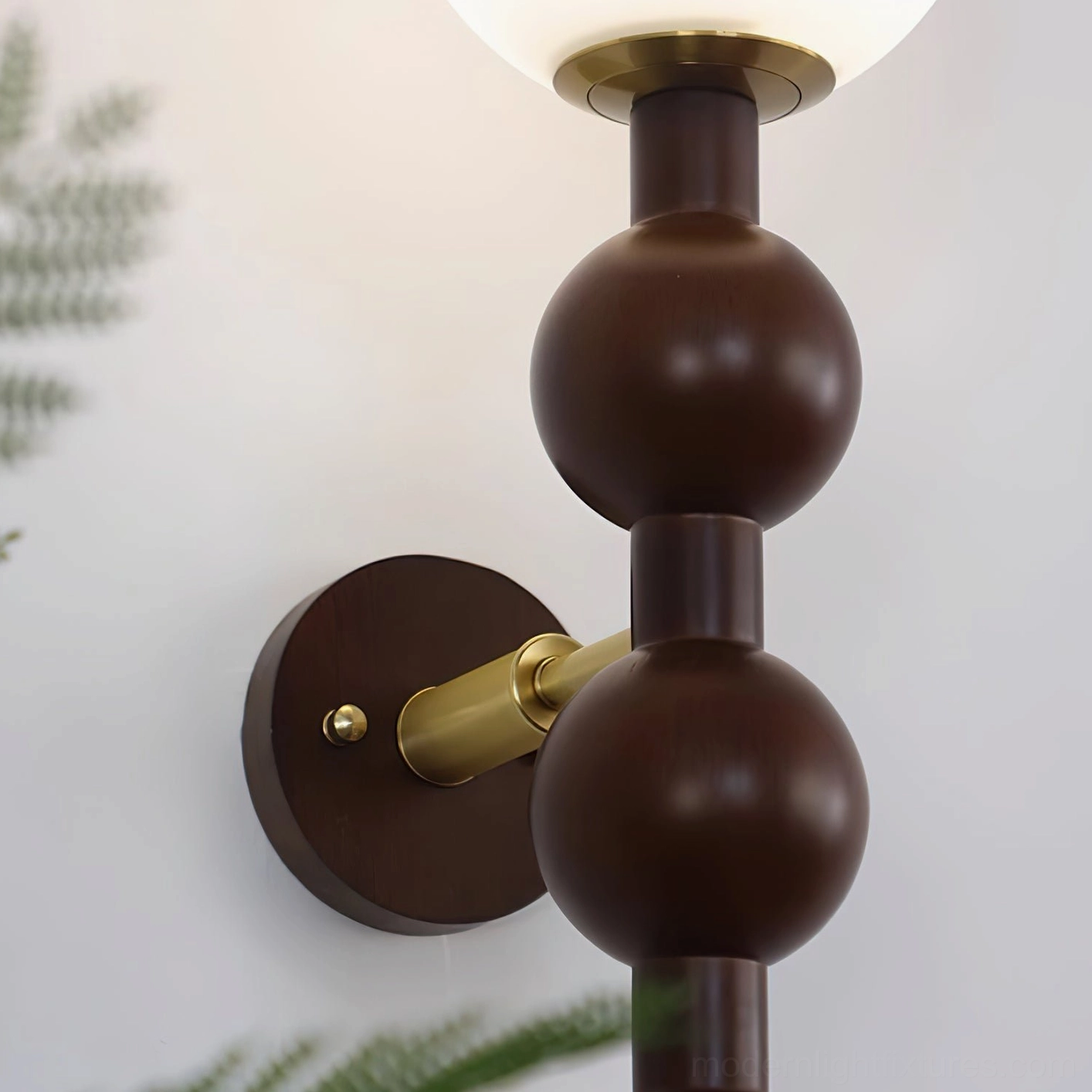 Selene beaded wall lamp in industrial modern loft with exposed brick and metal accents