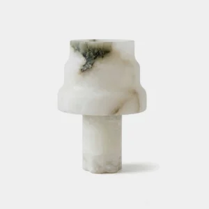 Selmora alabaster table lamp direct front view with natural white veining and tiered stepped shade on studio background