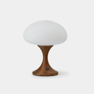 Seluna retro-modern table lamp with frosted white opal glass shade and walnut wood base, front view on studio background
