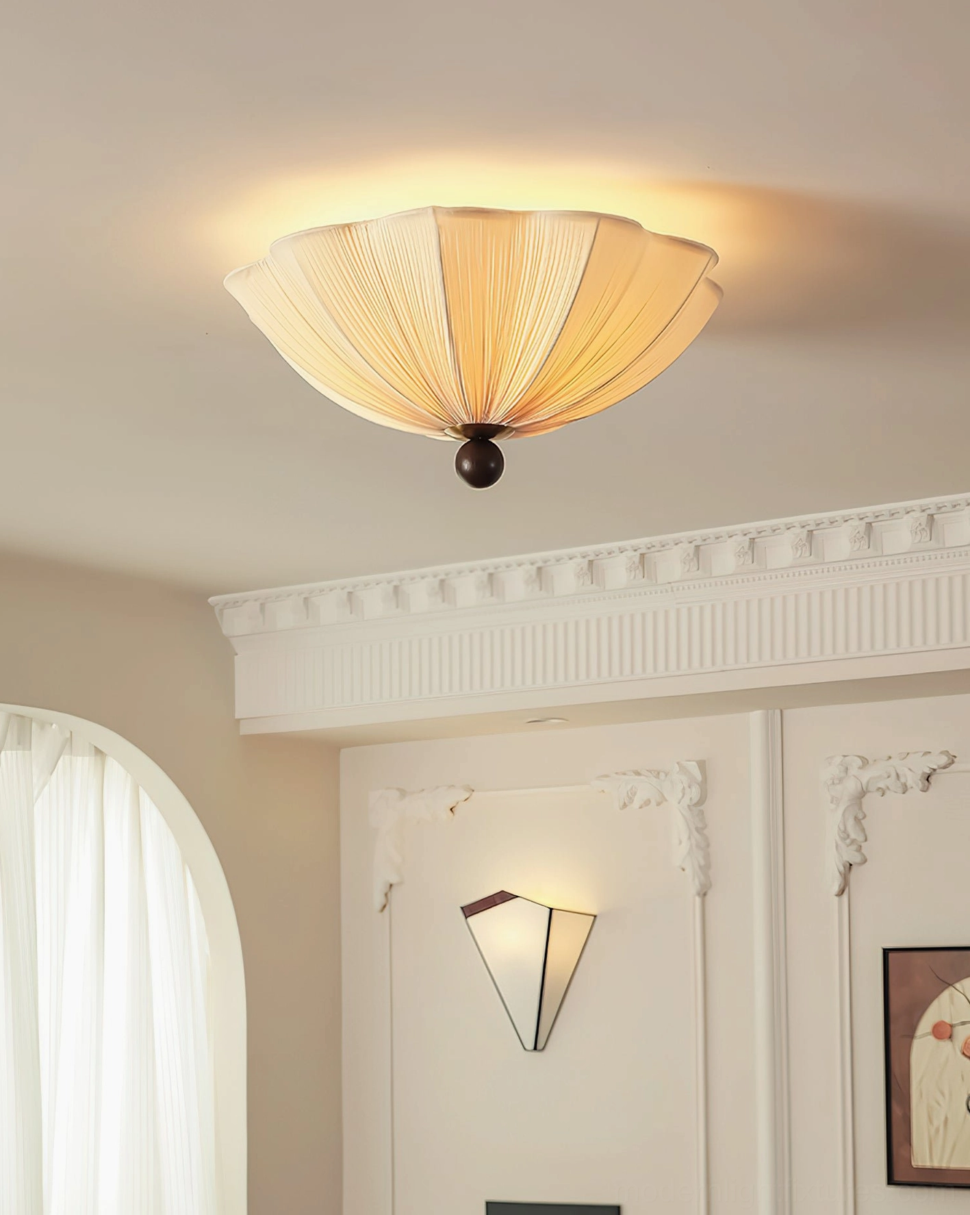 Seralyn modern scalloped ceiling light installed in French-style residential room with arched window, warm beige shade with dark base in elegant interior