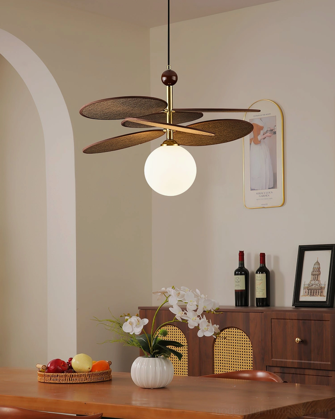 Vintage-inspired pendant fixture with frosted glass shade and solid walnut wood accents in retro dining space