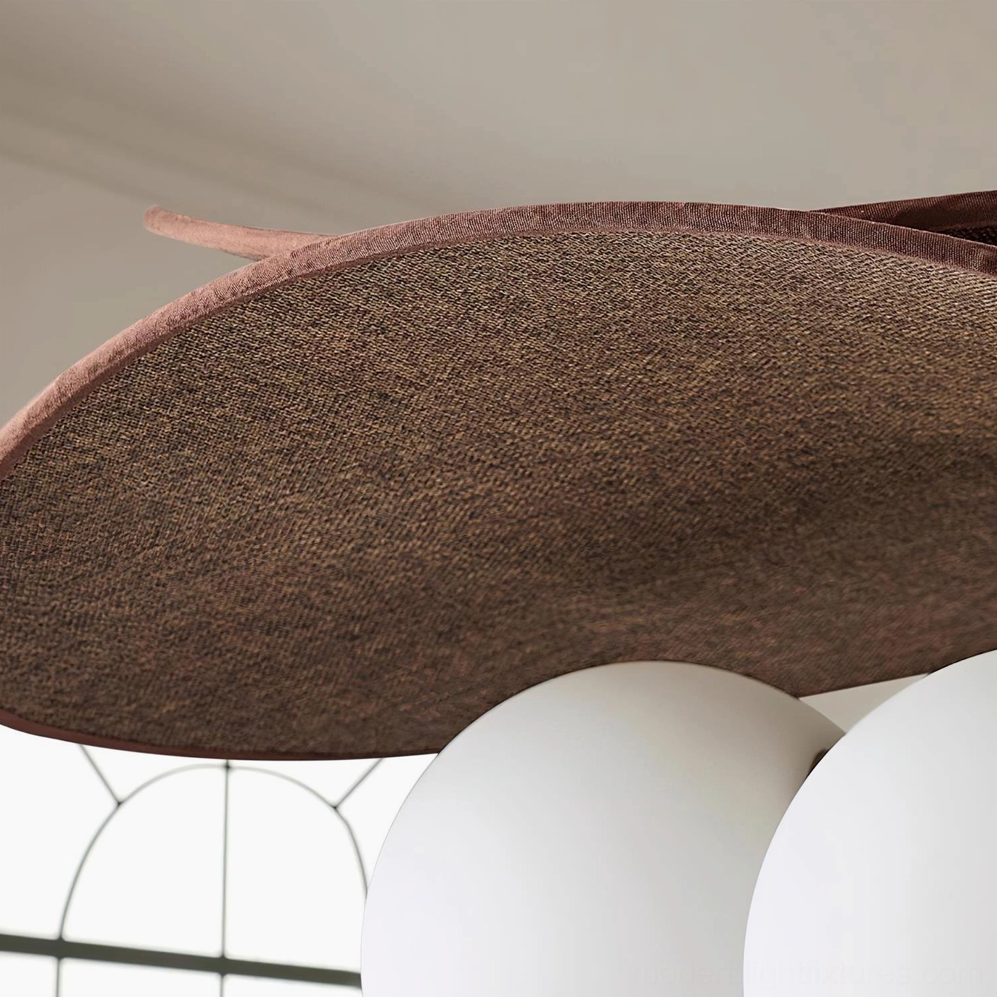 Seraphis pendant light architectural detail showing precision joinery and metal bracket components