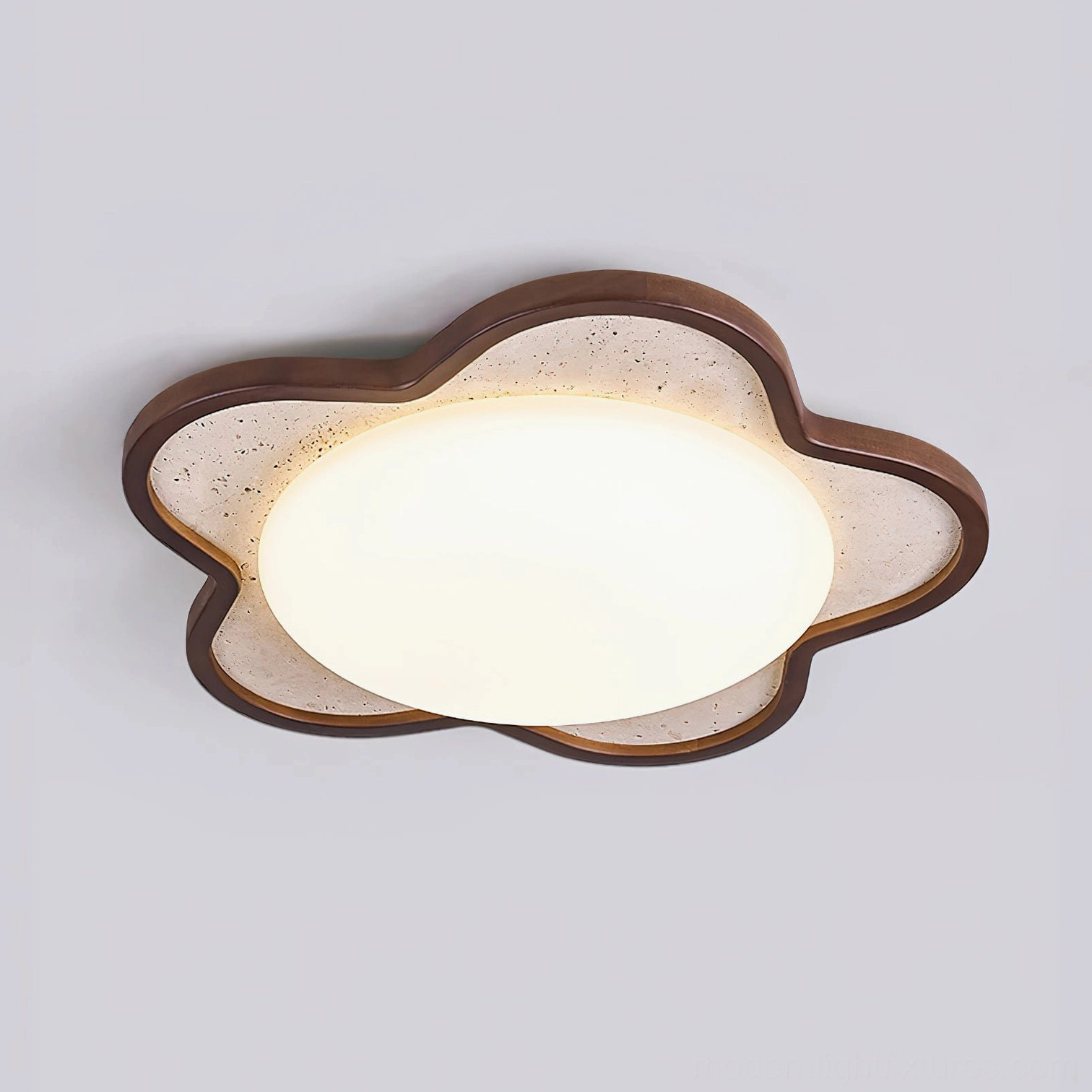 Seraphis illuminated warm white ceiling light showing travertine texture and walnut wood frame