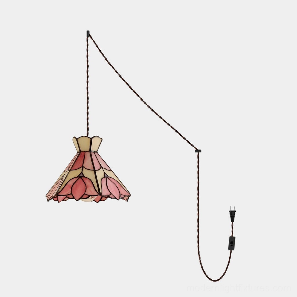 Serena stained glass lotus pendant light with pink and cream hand-cut glass panels and soldered copper-foil seams, front studio view with braided cord and inline switch