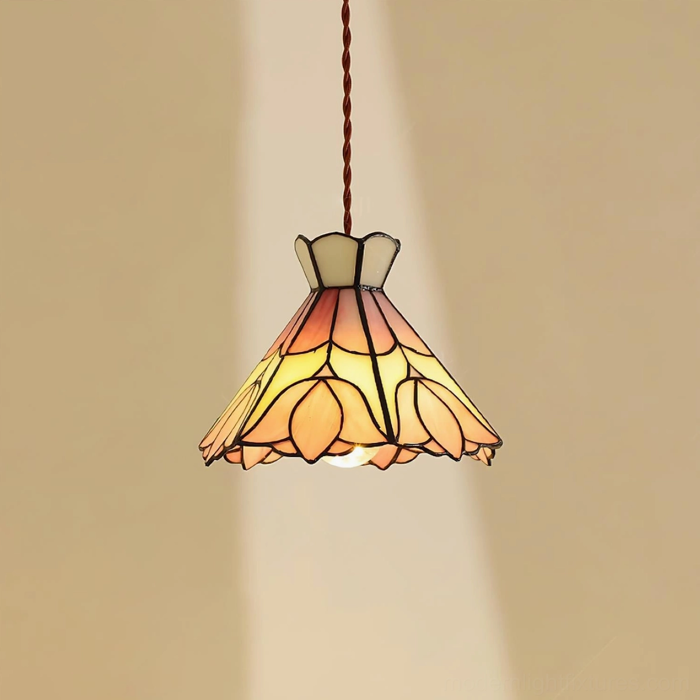 Serena Tiffany pendant light warm glow illumination stained glass pink shade atmospheric lighting