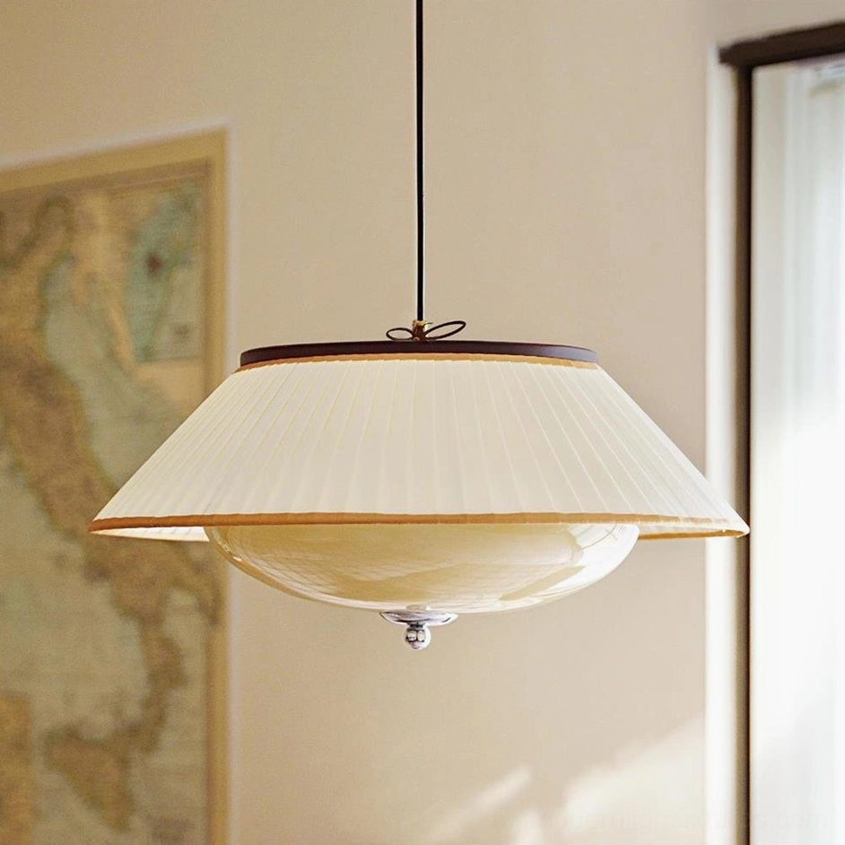 Serenique vintage pendant light in living room, three-quarter angle showing warm ambient light