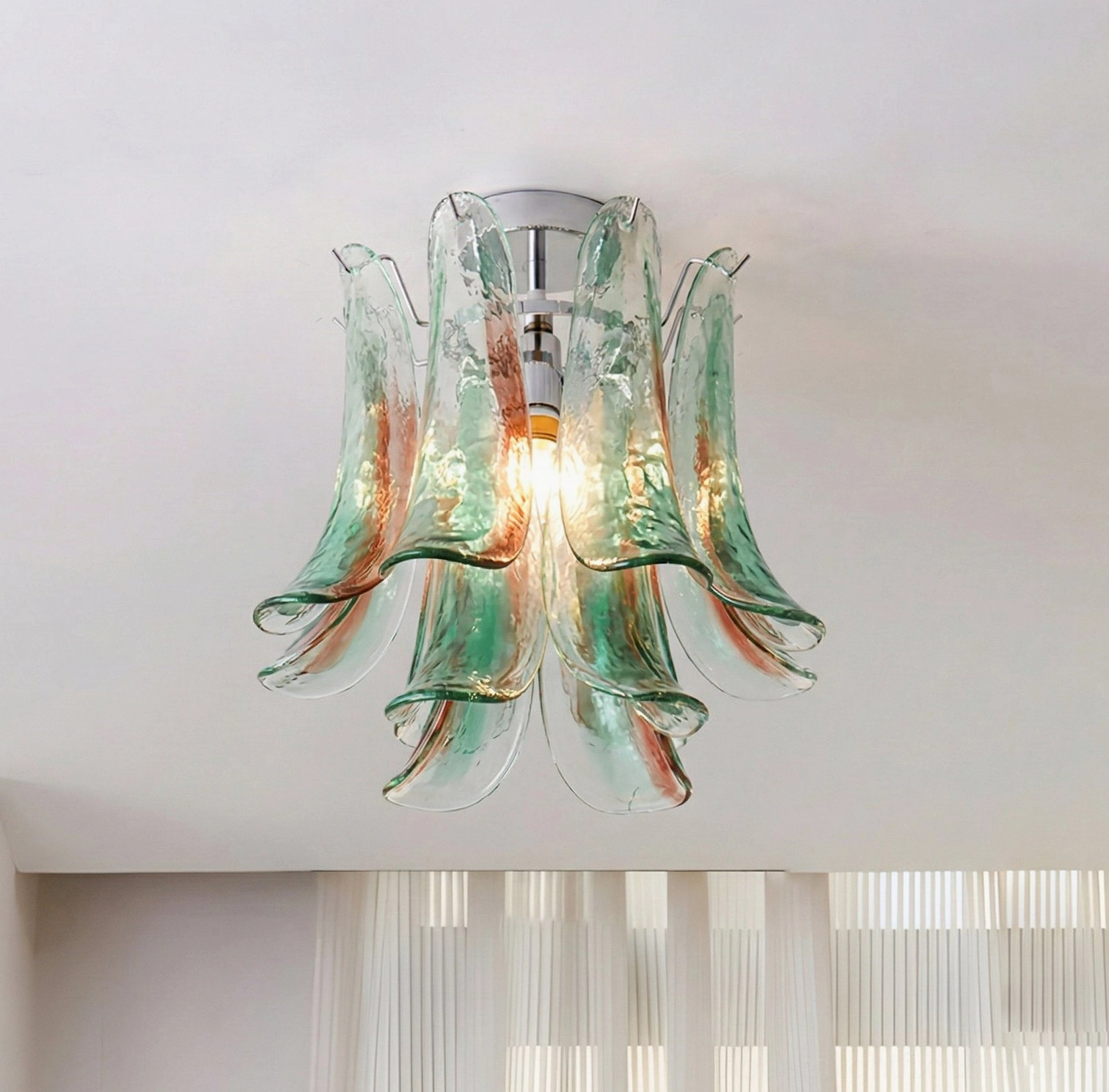 Green tinted layered glass ceiling fixture in contemporary minimalist home space