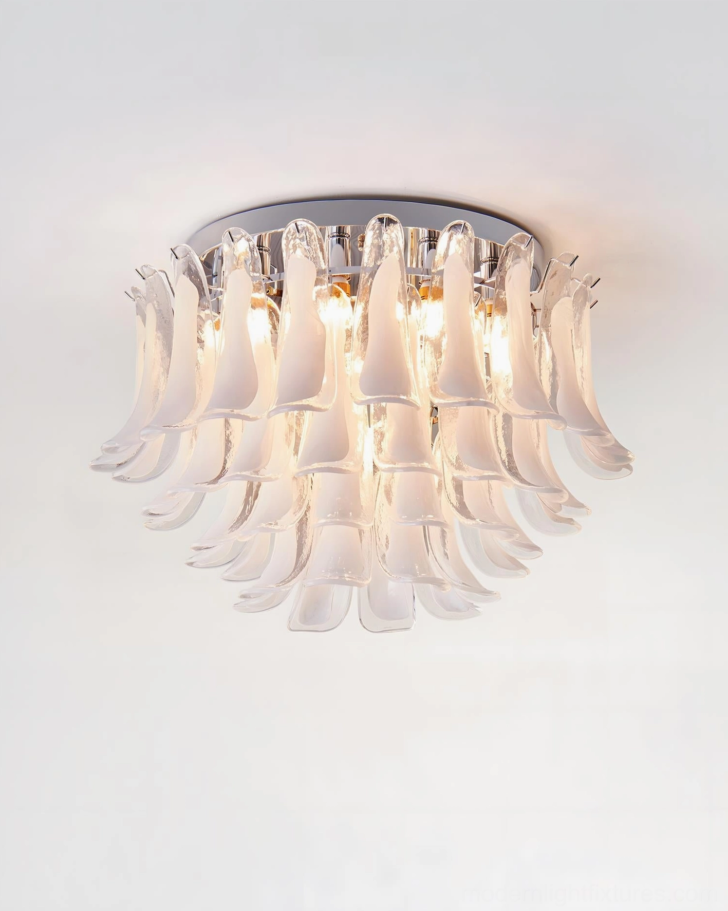 Layered glass petal ceiling fixture ambient light cast warm glow