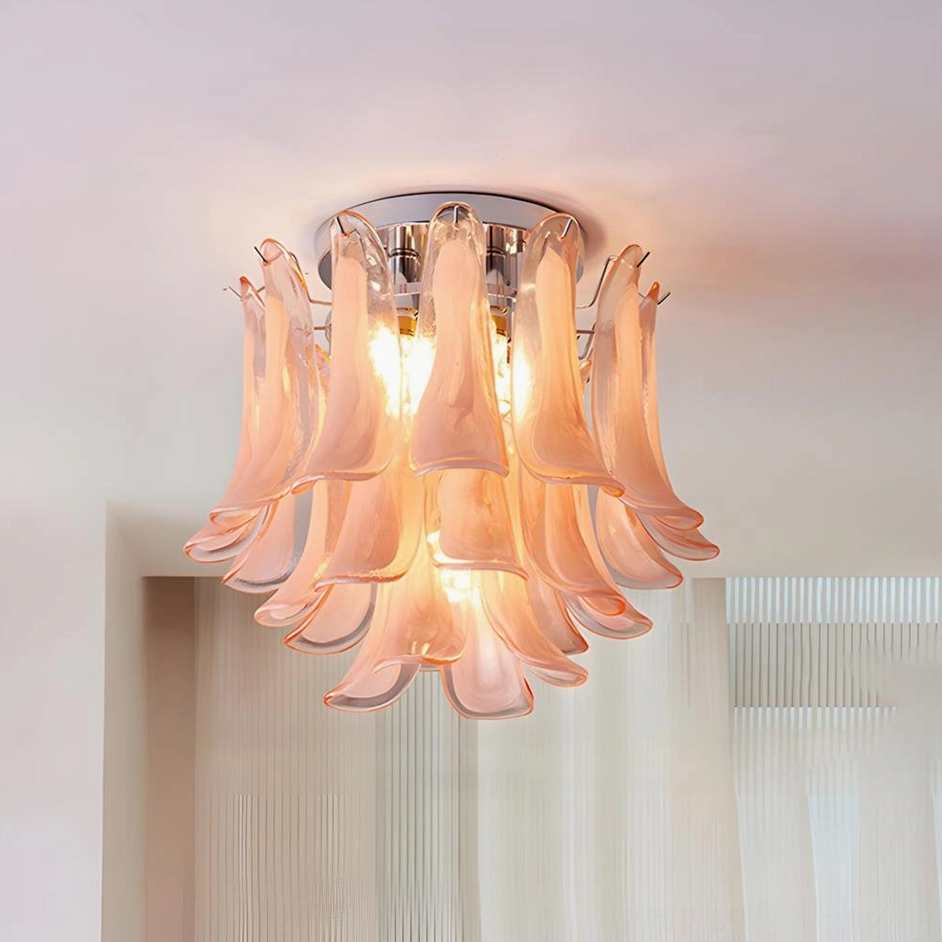 Soft pink tiered glass petal flush mount ceiling light in minimalist interior