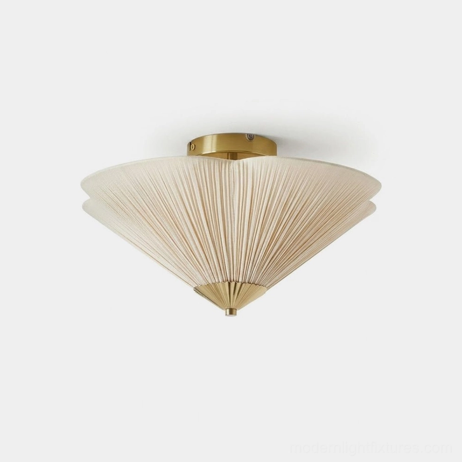 Seretta pleated linen flush mount ceiling light with warm gold brass hardware and ivory shade, front view