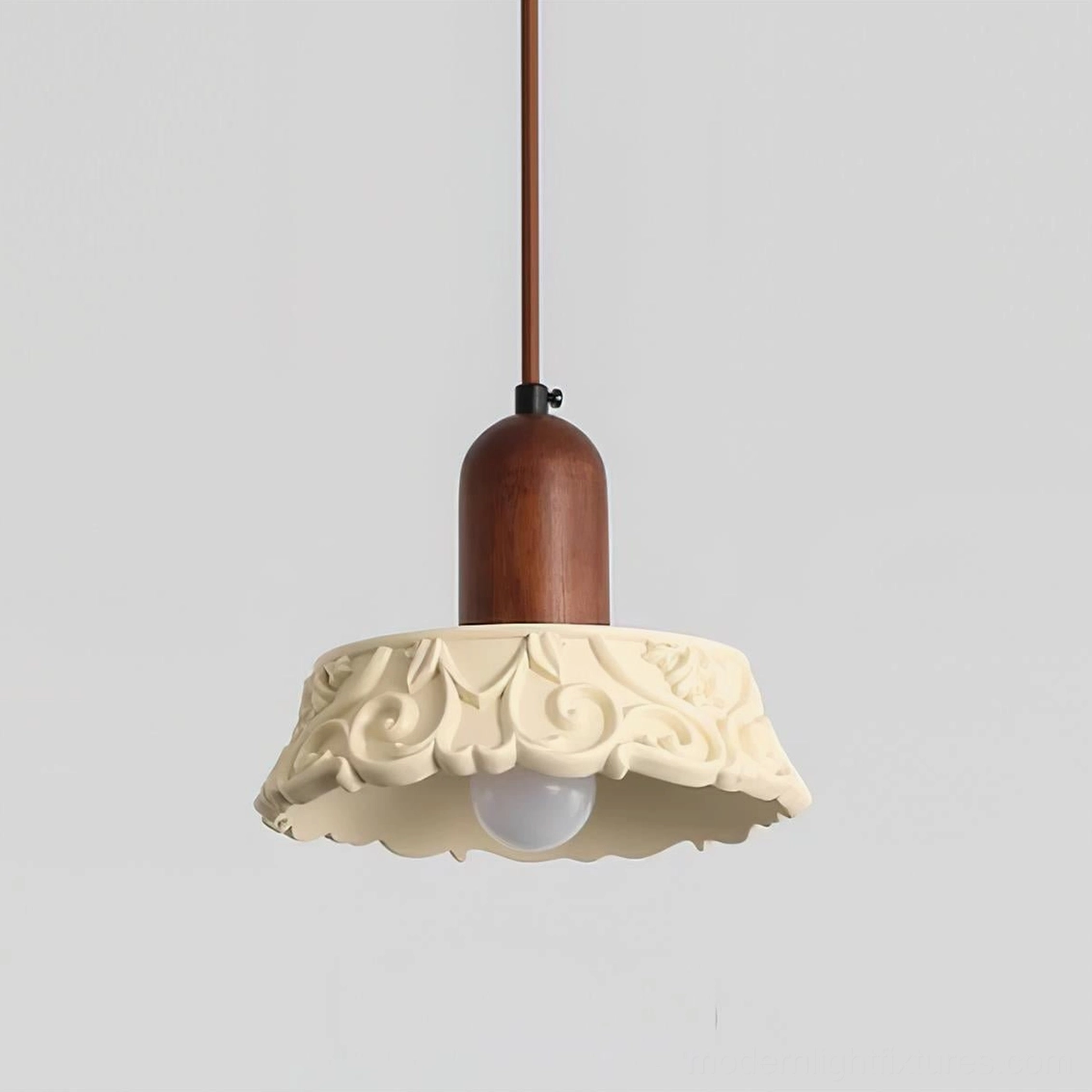 Bottom view of Shana carved resin pendant lamp showing intricate wavy embossed shade texture and exposed bulb