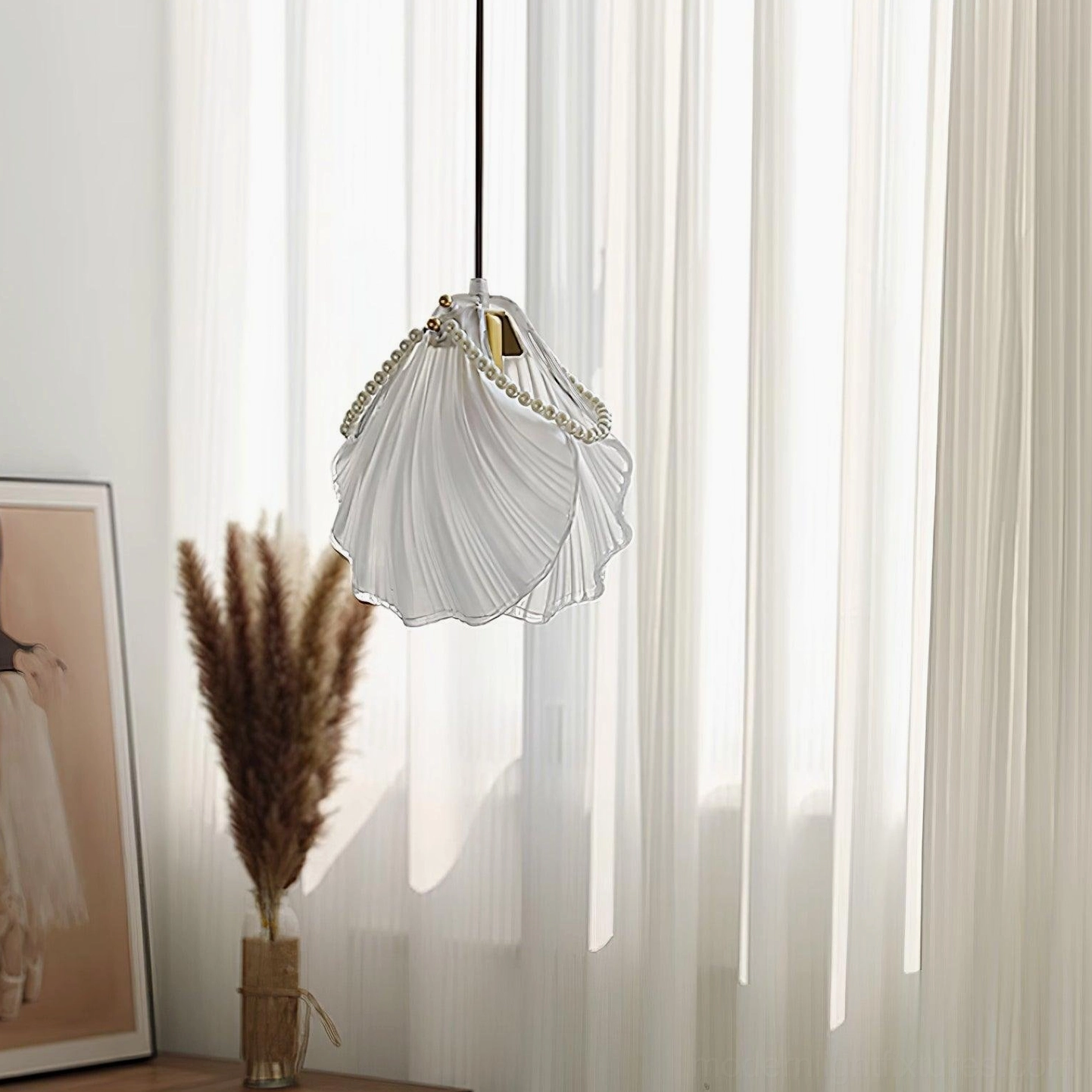 Shell pendant ceiling light side angle showing semi-transparent white glass and bead decoration