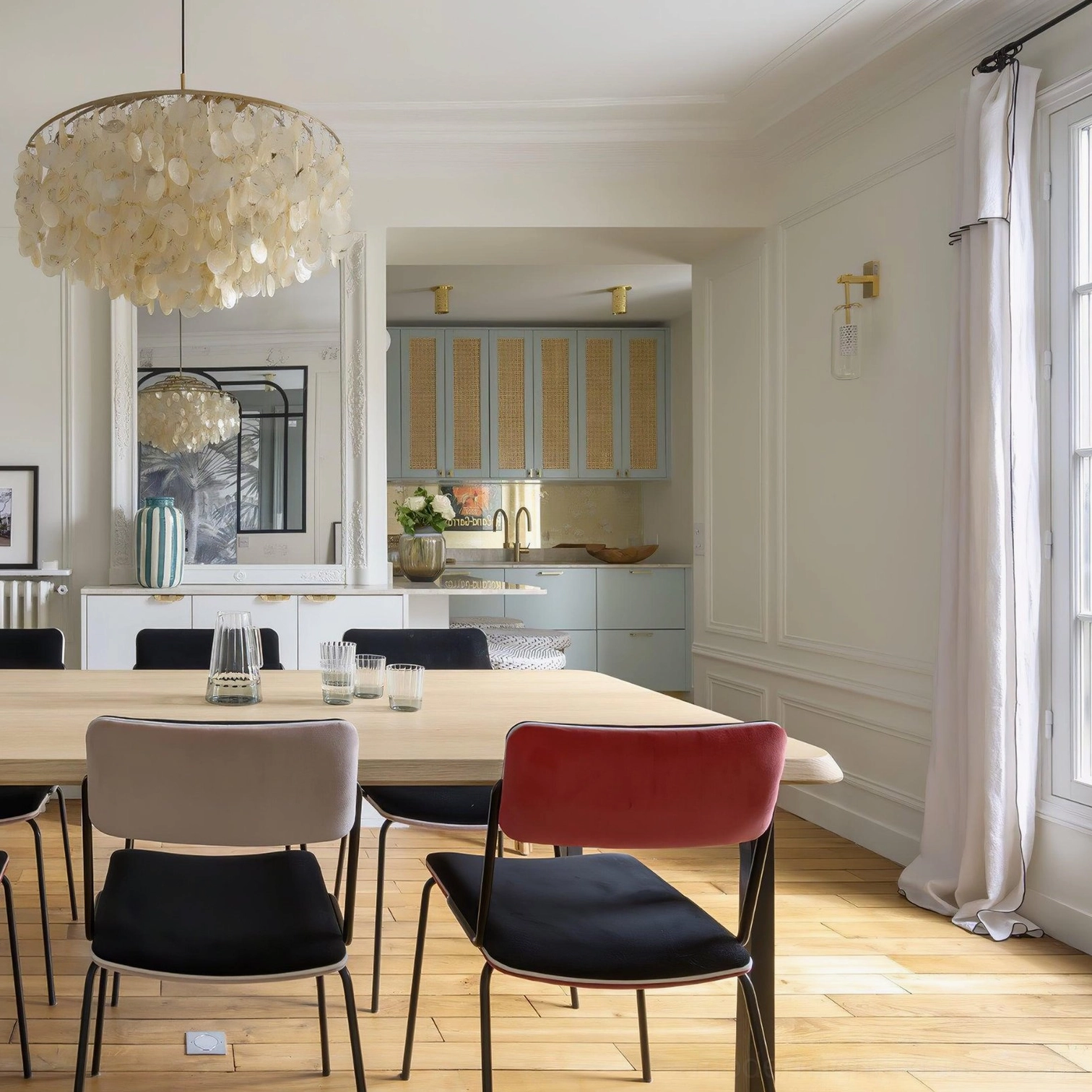 Shell pendant light fixture showcase in contemporary living space, neutral tones