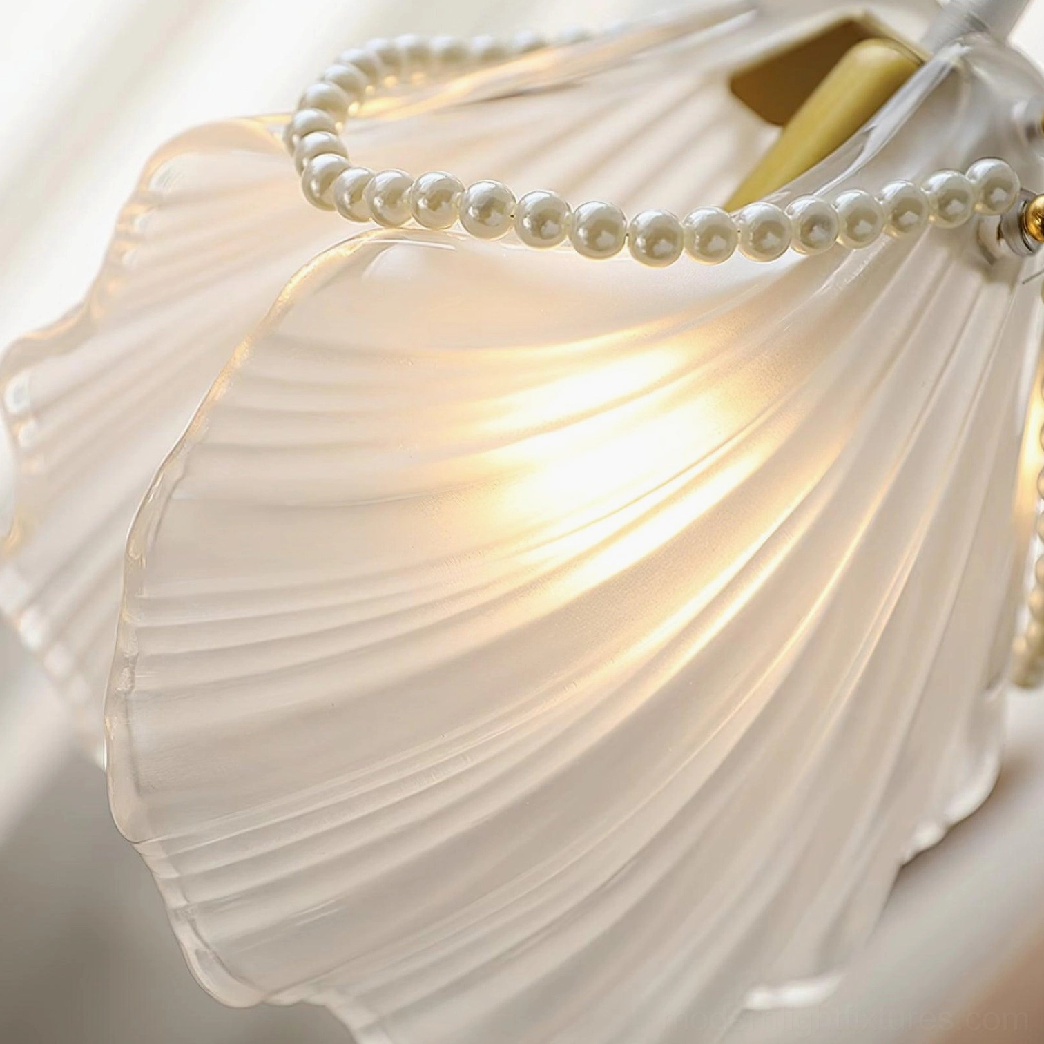 Shell pendant light ambiance showcase with warm glowing effect and interior design styling