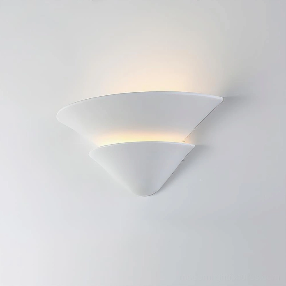 Shellora wall sconce light and shadow interplay architectural lighting