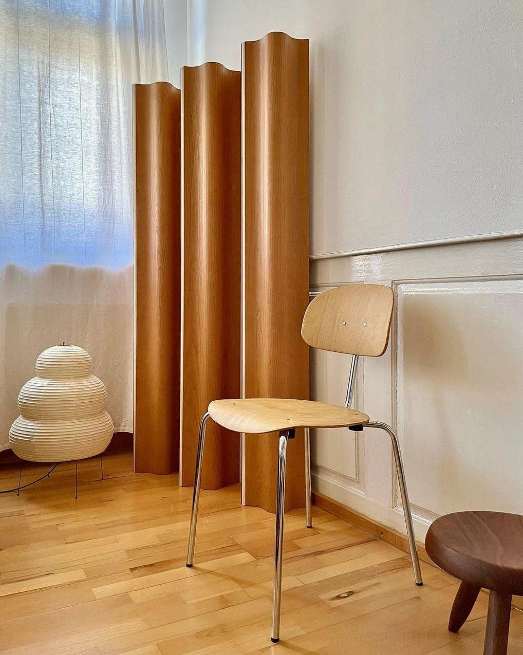 White tiered Shoji paper table lamp detail, fine paper texture and warm light diffusion