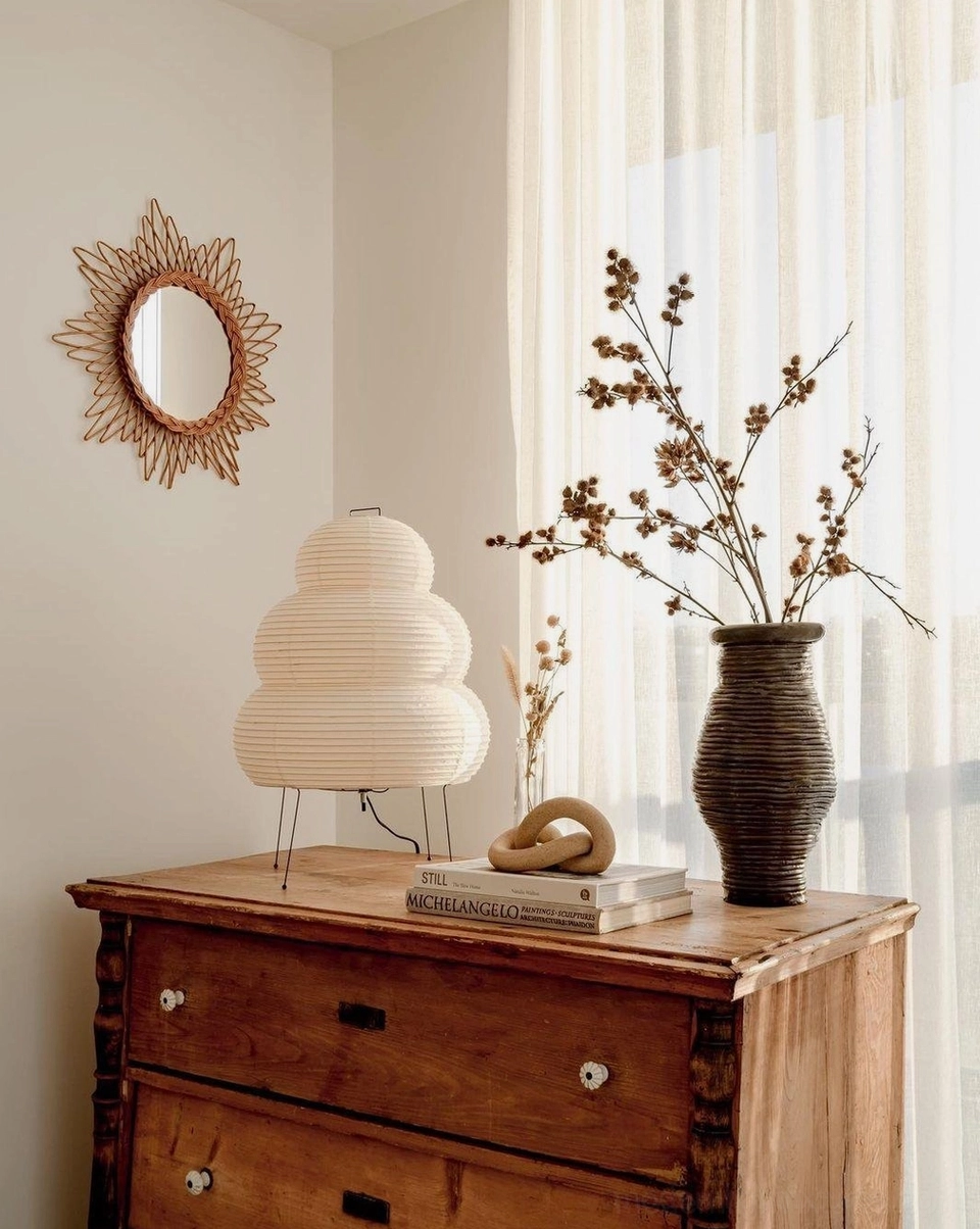 Tiered Shoji paper lamp beside modern decor, interior design accent lighting solution