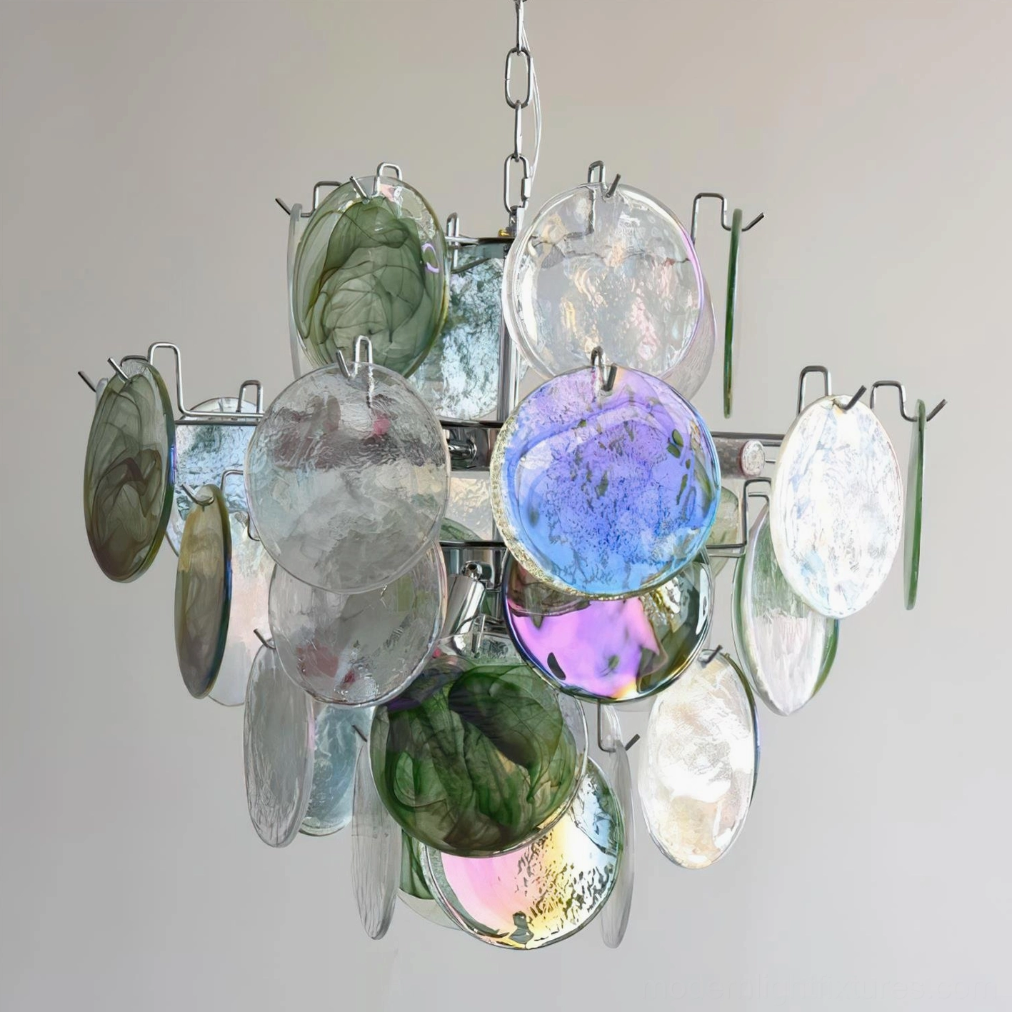 Side angle view of iridescent glass disc chandelier highlighting depth and layered structure