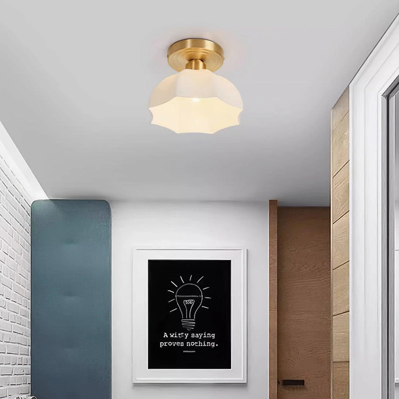 Side profile view of scalloped brass semi-flush ceiling fixture showing height and proportions