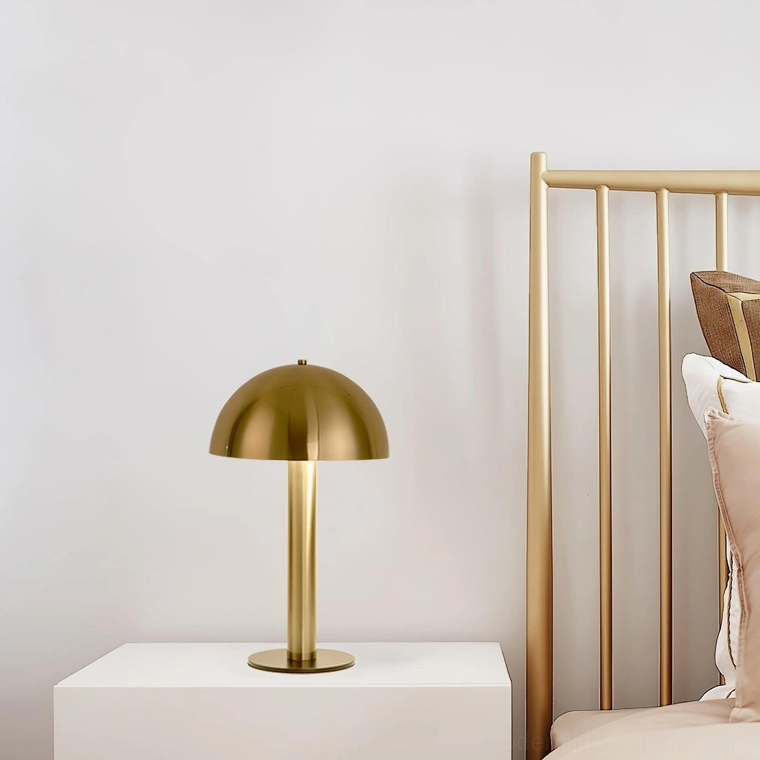 Copper metallic mushroom table lamp on white nightstand with gold bed frame - bedroom lighting