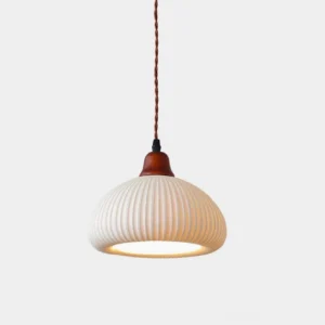 Sidra white ceramic pendant light with ribbed shade and oak wood canopy, front studio view