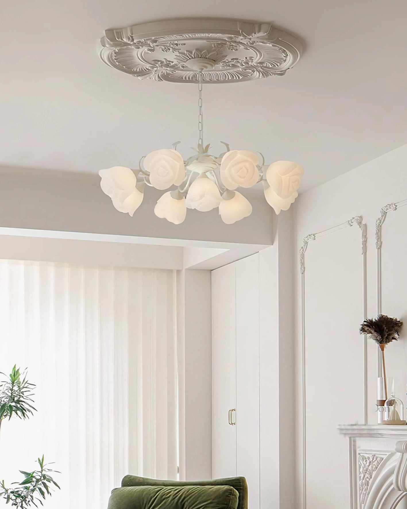 French Siena Rose Chandelier mounted on carved ceiling plate in minimalist white room with frosted acrylic rose lampshades