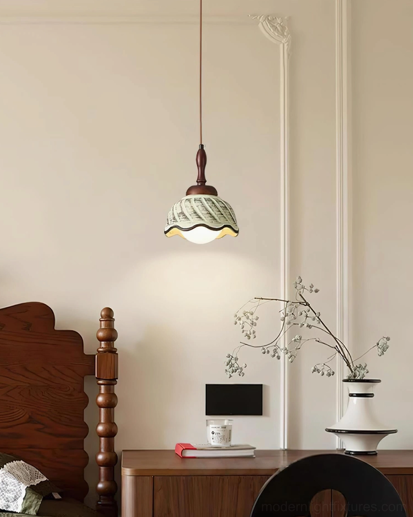 Sienna ceramic pendant light suspended above wooden vanity desk in vintage bedroom study space