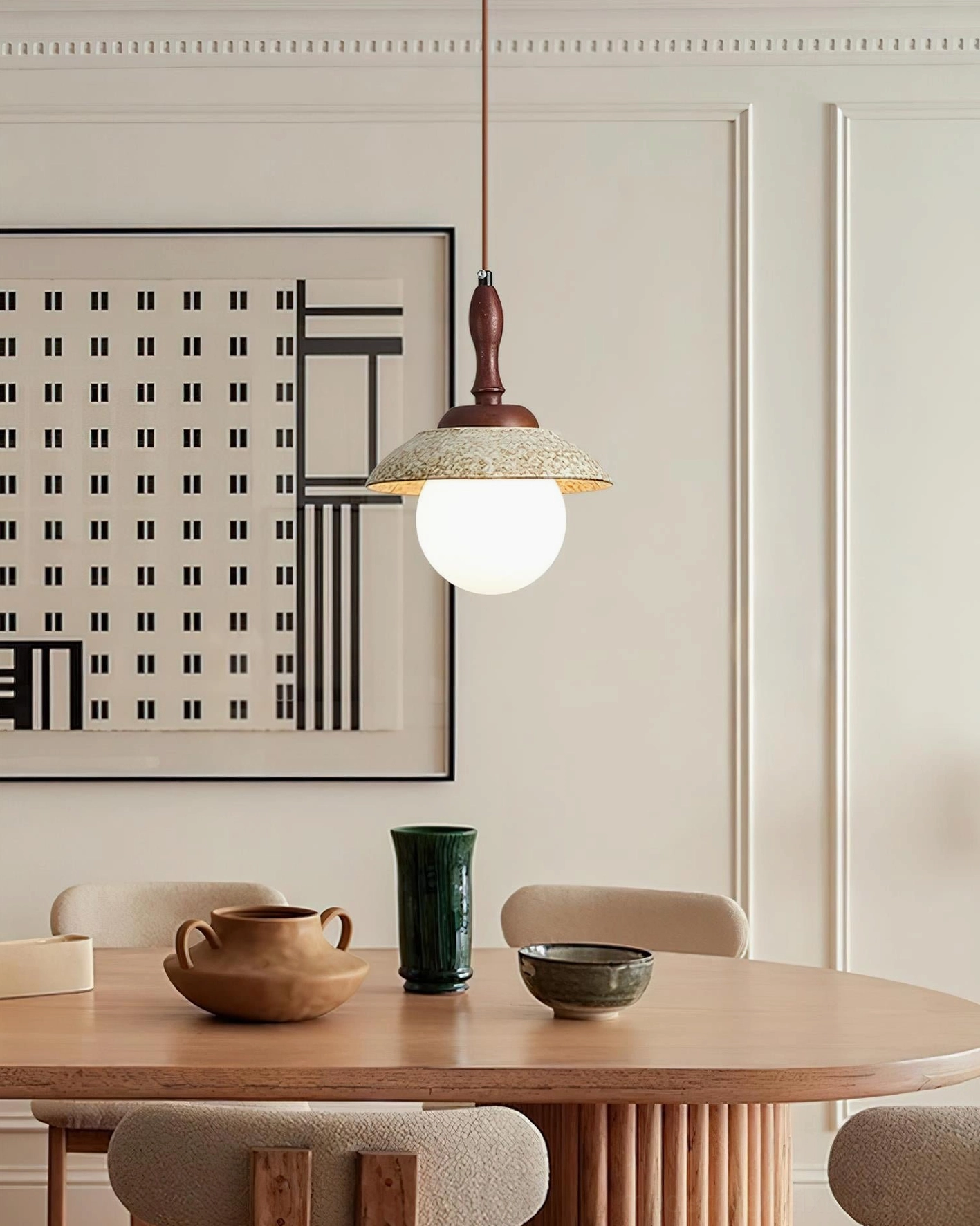 Sienna pendant lamp with wavy ceramic shade above round wooden dining set in modern vintage room