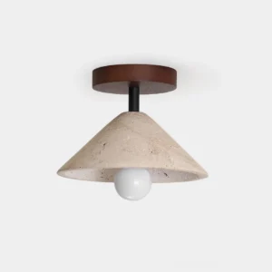 Sierra travertine semi-flush ceiling light with conical stone shade and exposed bulb in studio lighting