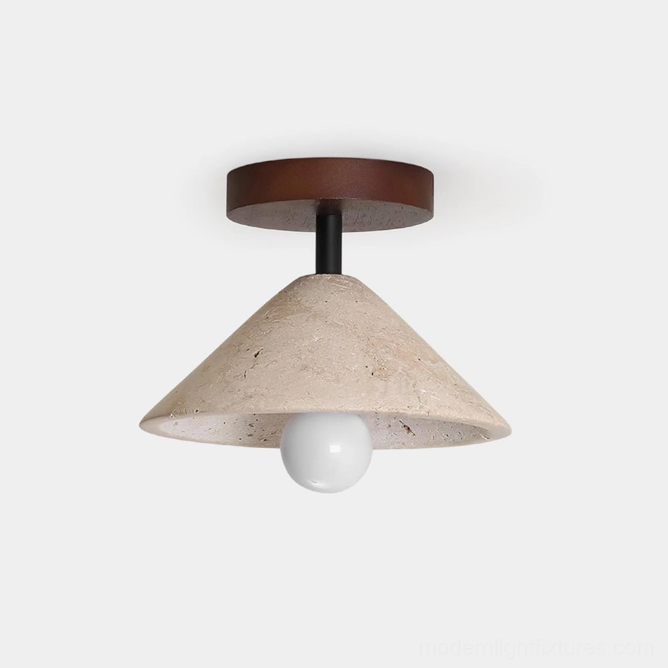 Sierra travertine semi-flush ceiling light with conical stone shade and exposed bulb in studio lighting