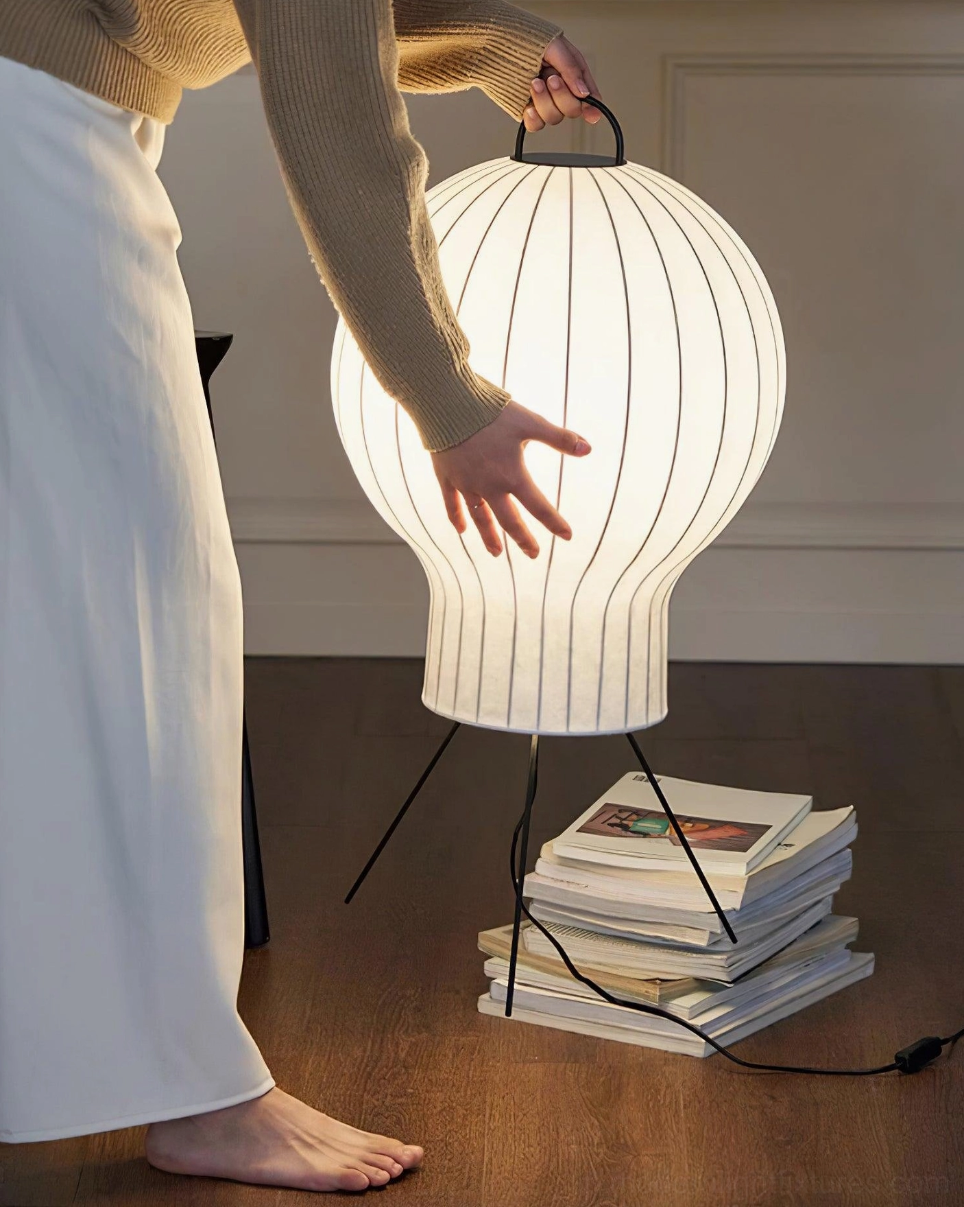 Handcrafted silk floor lamp carrying handle and tripod leg construction
