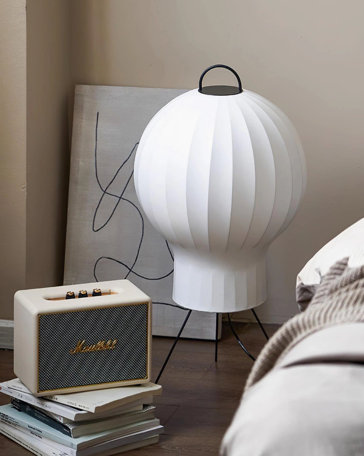 Handcrafted silk floor lamp in living room with beige sofa and gray rug aesthetic