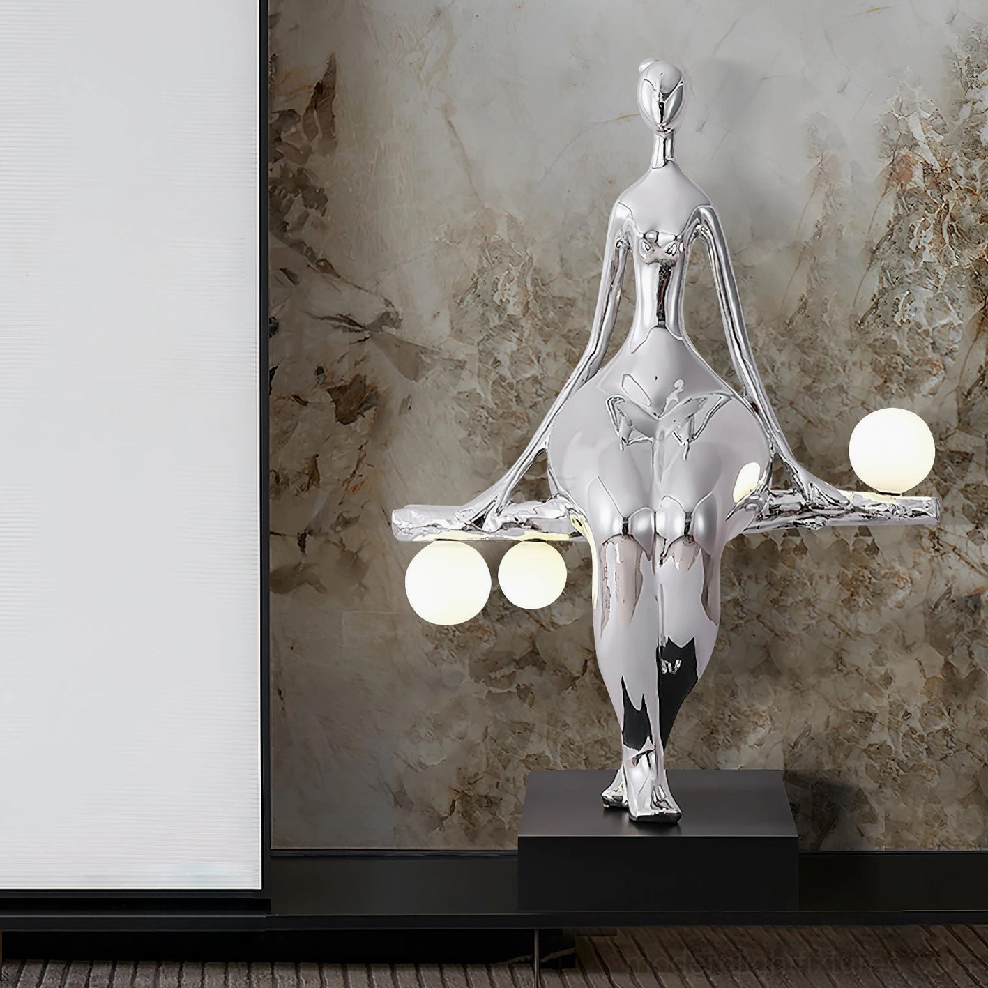 Silver glossy finish sculpture floor lamp with frosted globe light beads, marble wall interior modern aesthetic