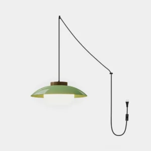 Sima modern plug-in pendant lamp with sage green saucer shade and warm wood top accent detail, front view against white background
