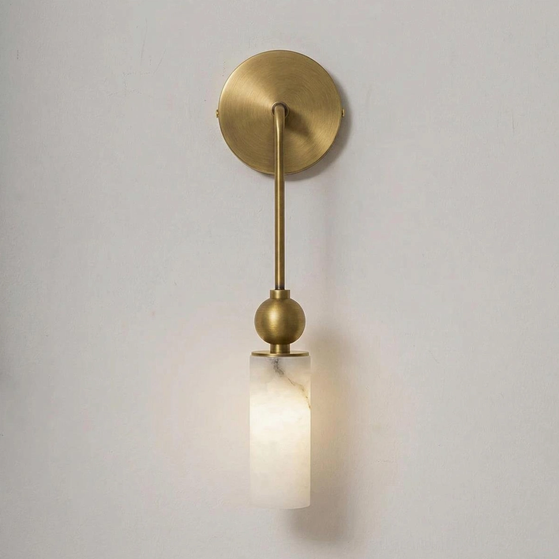 Single-head minimalist alabaster wall sconce front flat product view - polished brass finish with geometric cylindrical shade design