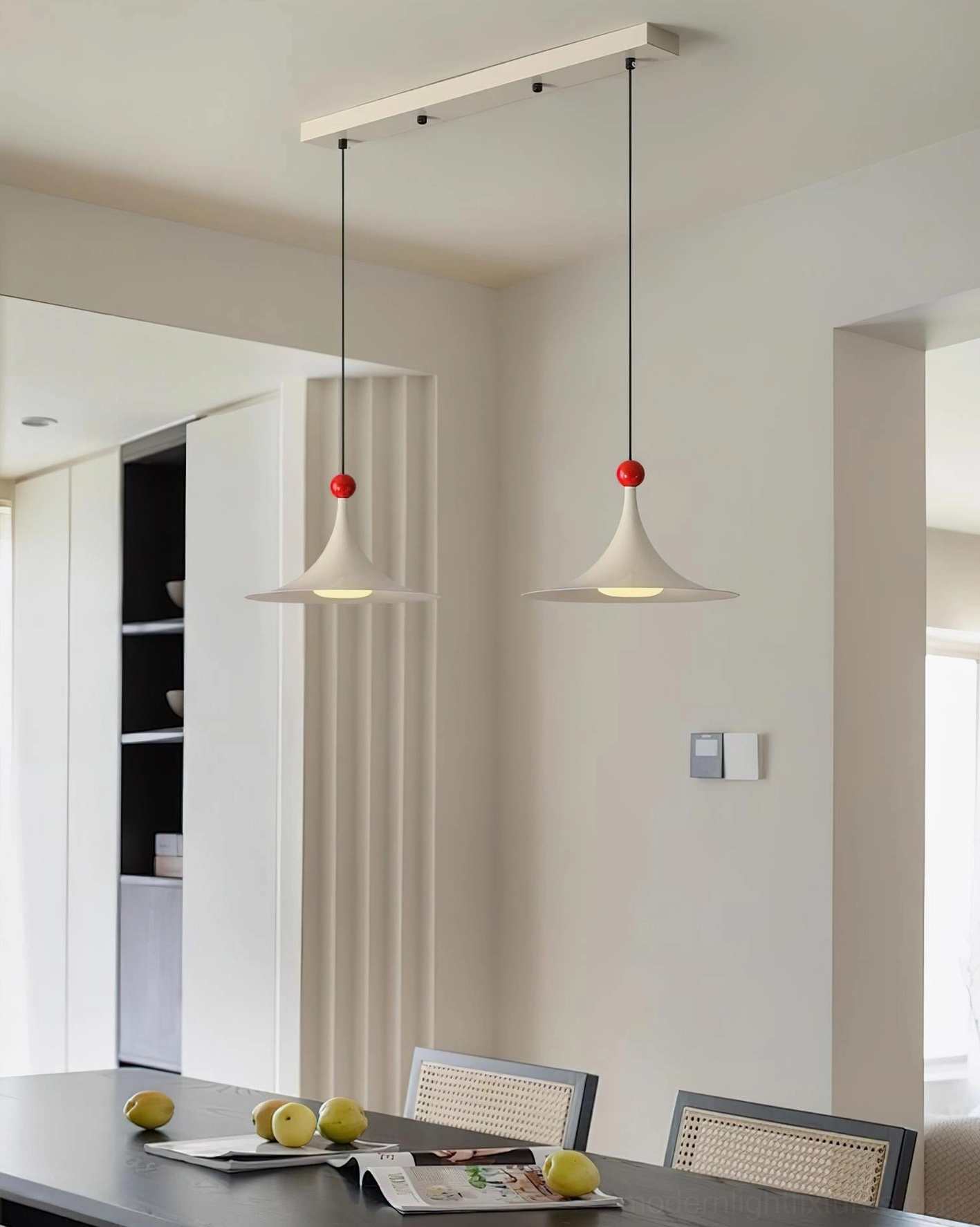 Sirocco dual-head pendant light set with cream shades and red tops in modern residential dining area