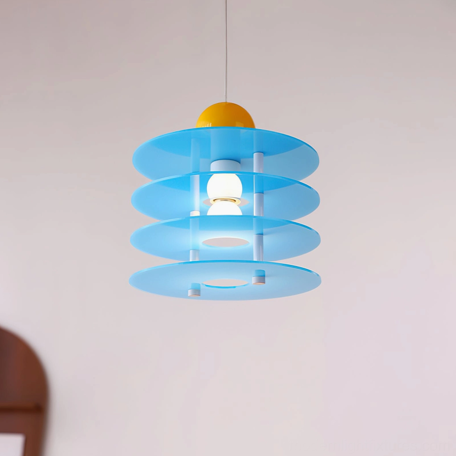 Sky blue stacked acrylic pendant light with yellow decorative sphere accent