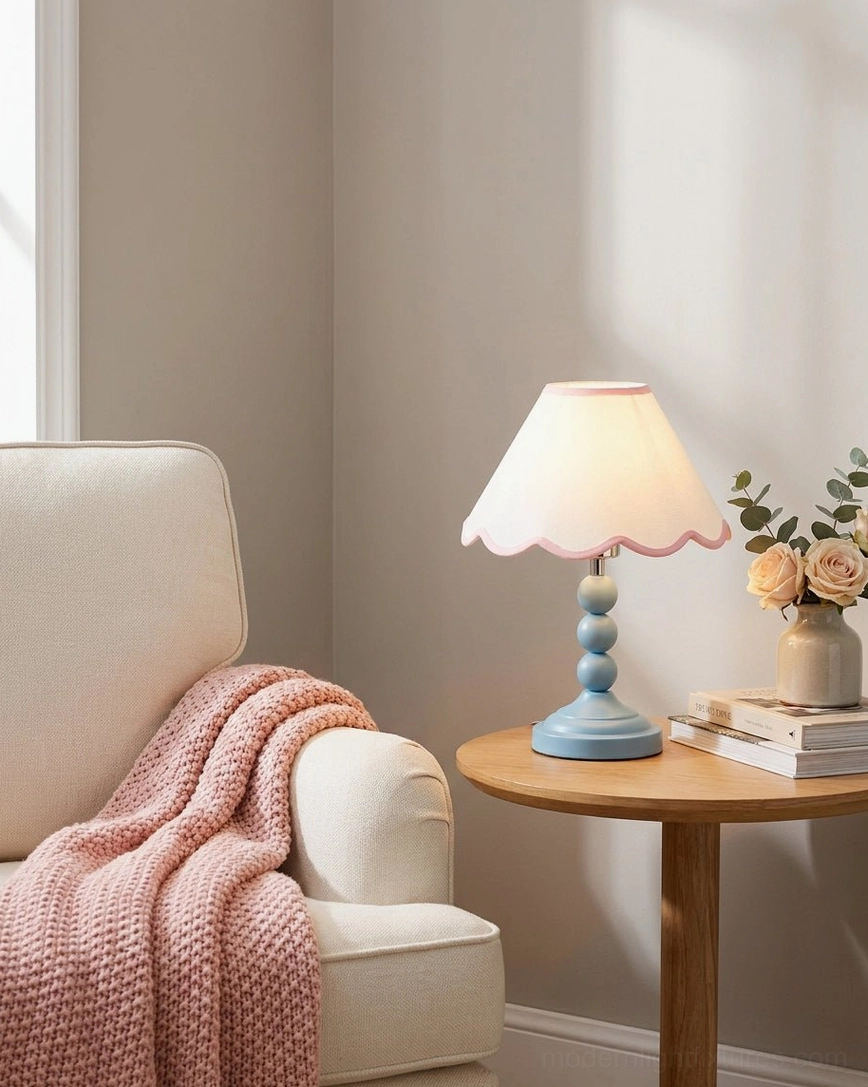 Skylisse table lamp side angle on living room side table with cozy farmhouse styling, knit throw and dried flowers