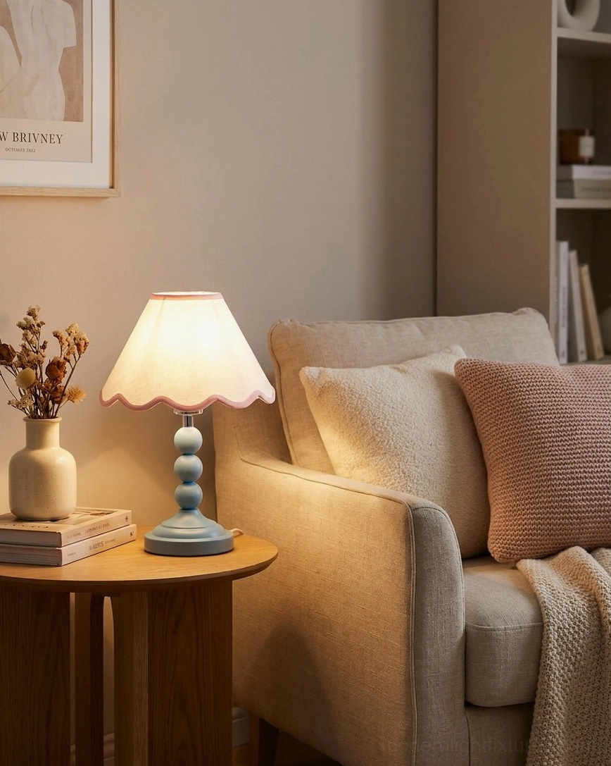 Skylisse table lamp on living room side table corner with neutral sofa and dried flower botanical decor