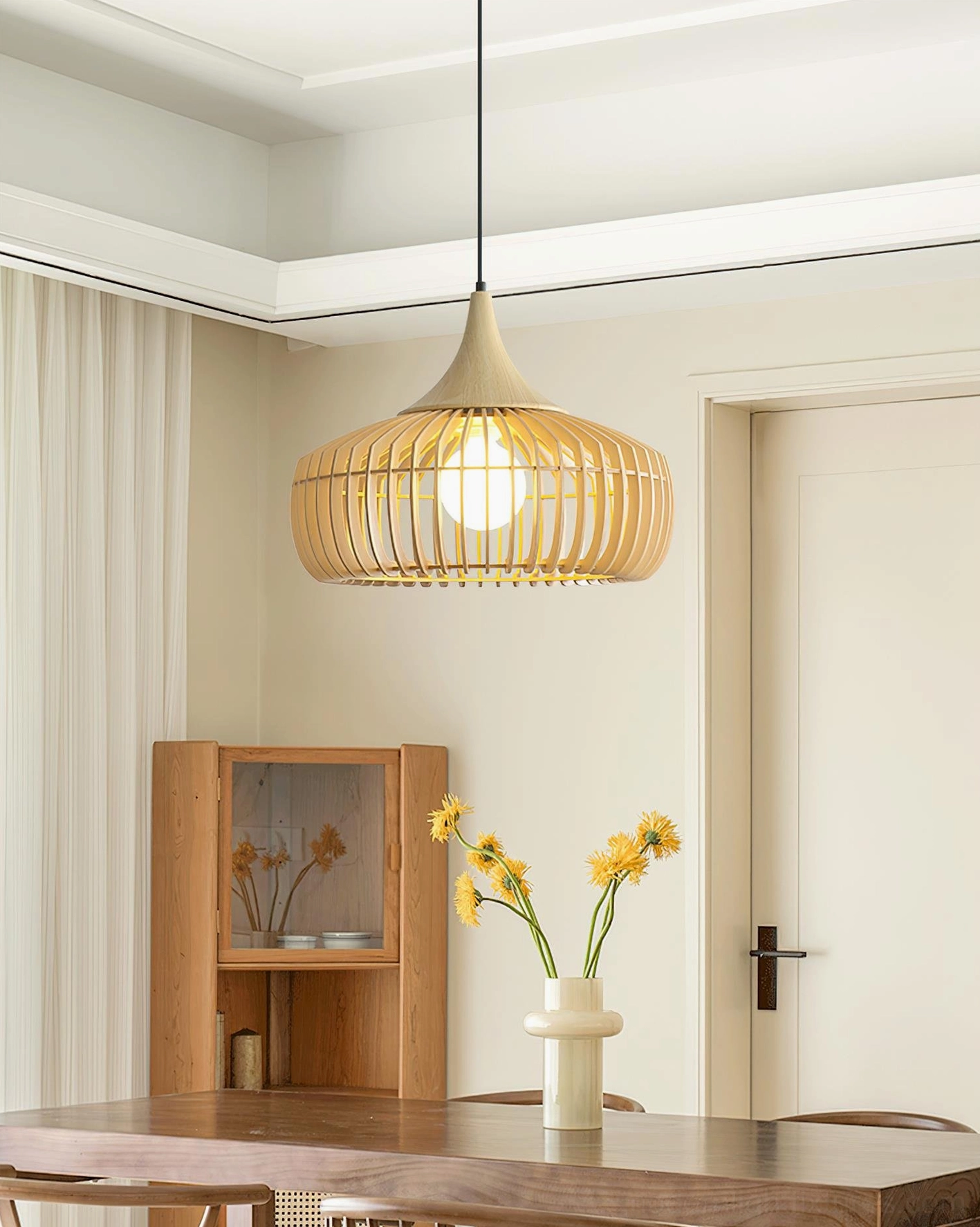 Slatted wood pendant lamp showing interior bulb visibility, warm glow through natural timber