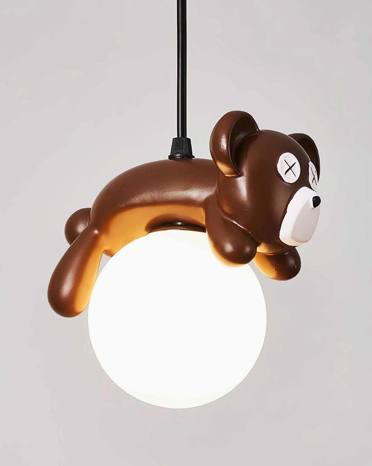 Whimsical sleepy bear pendant light stylized product showcase for modern home decor