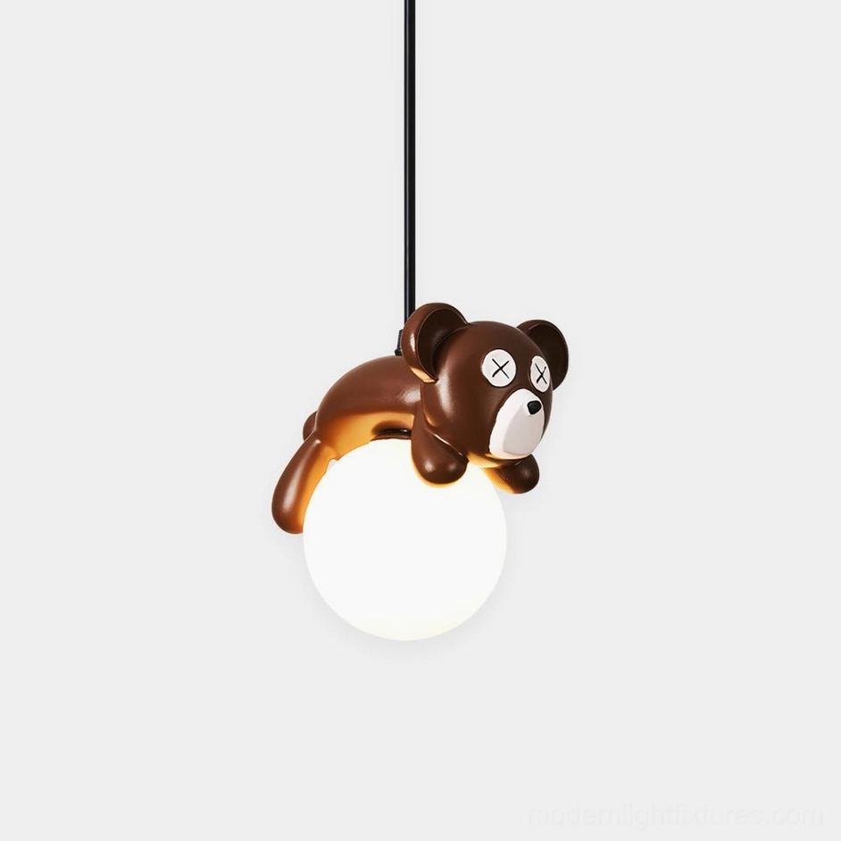 Sleepy Bear pendant light with frosted white glass shade and chocolate-toned resin bear character, front overhead studio view