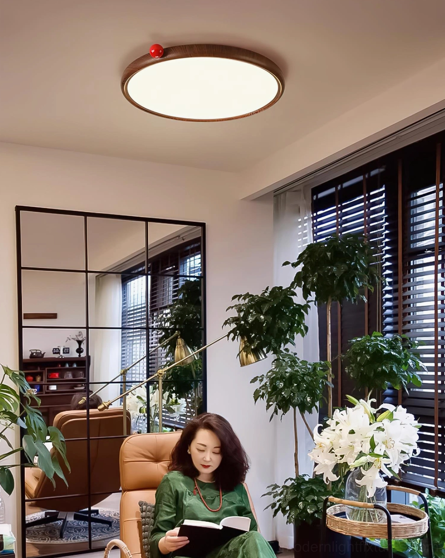 Slim circular LED ceiling light providing even ambient lighting in minimalist home design