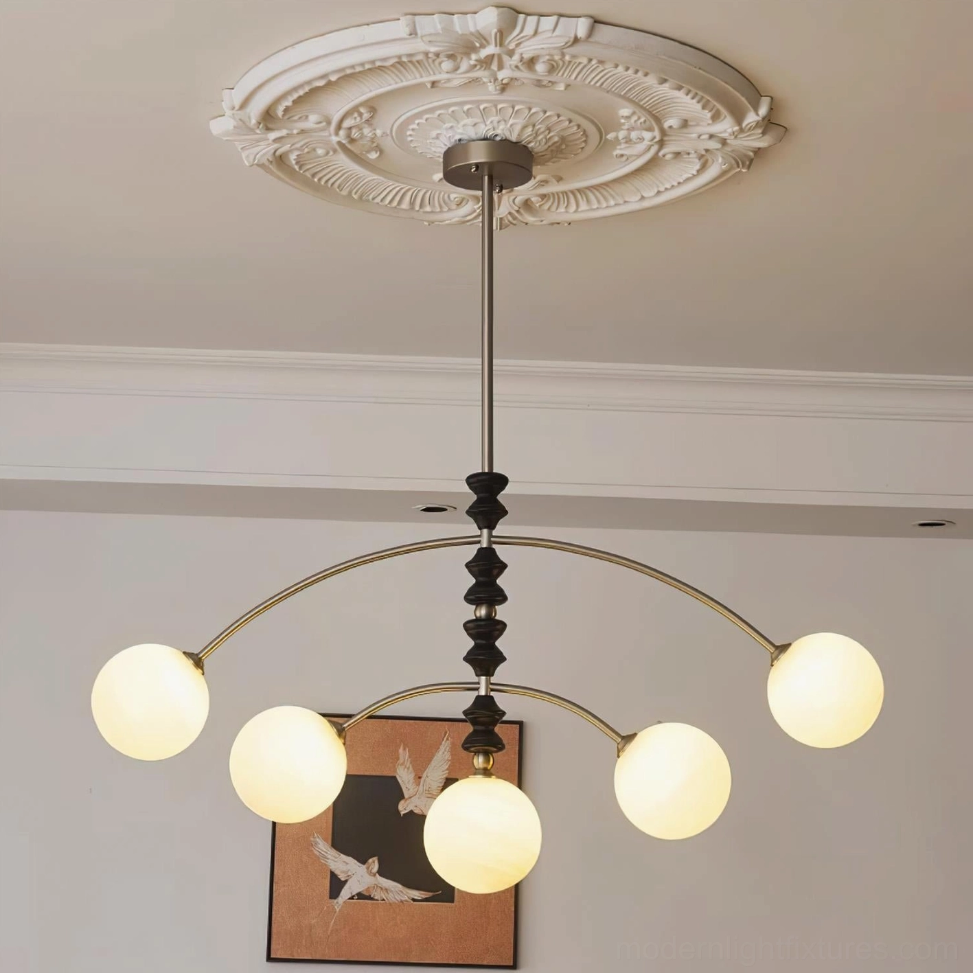 Modern arc chandelier installed in elegant American formal living room with warm lighting ambiance