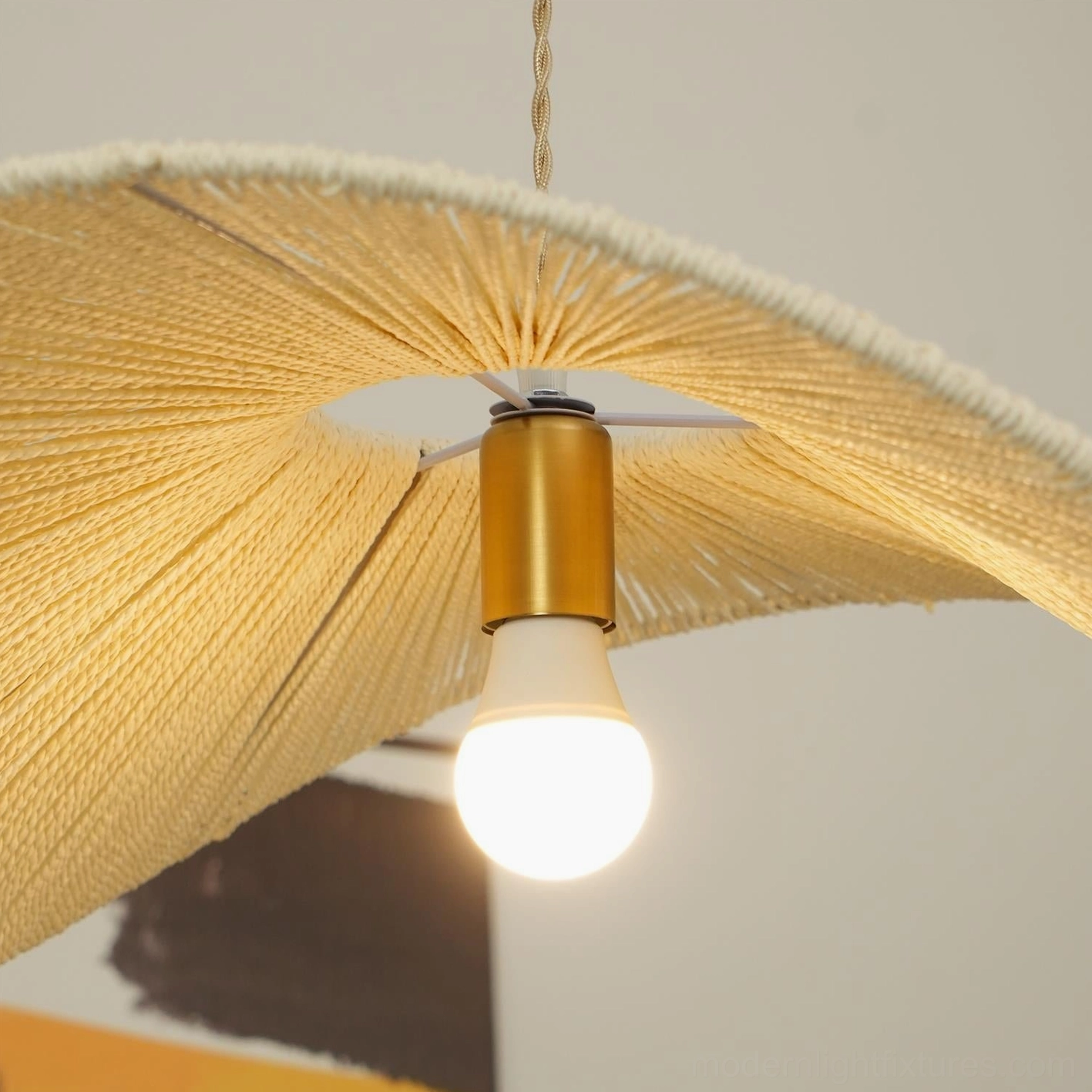 Natural brown woven straw hat pendant light compatible with sloped ceiling installations