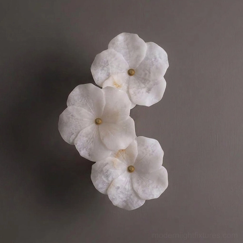 Small Alabaster Bloom Wall Sconce with 3 carved alabaster petals and brass stud centers