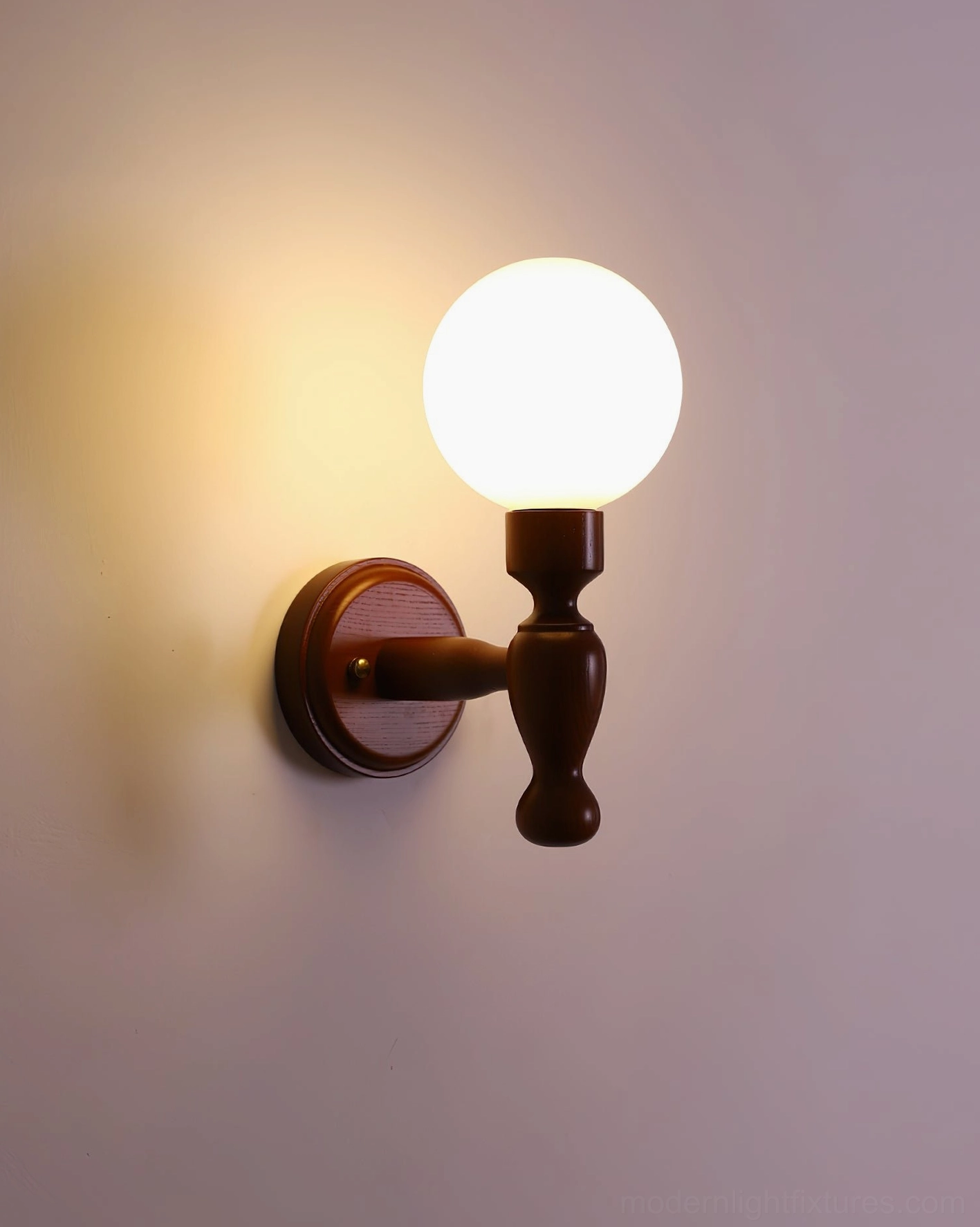 Small artisan wall sconce, wooden construction with patterned shade