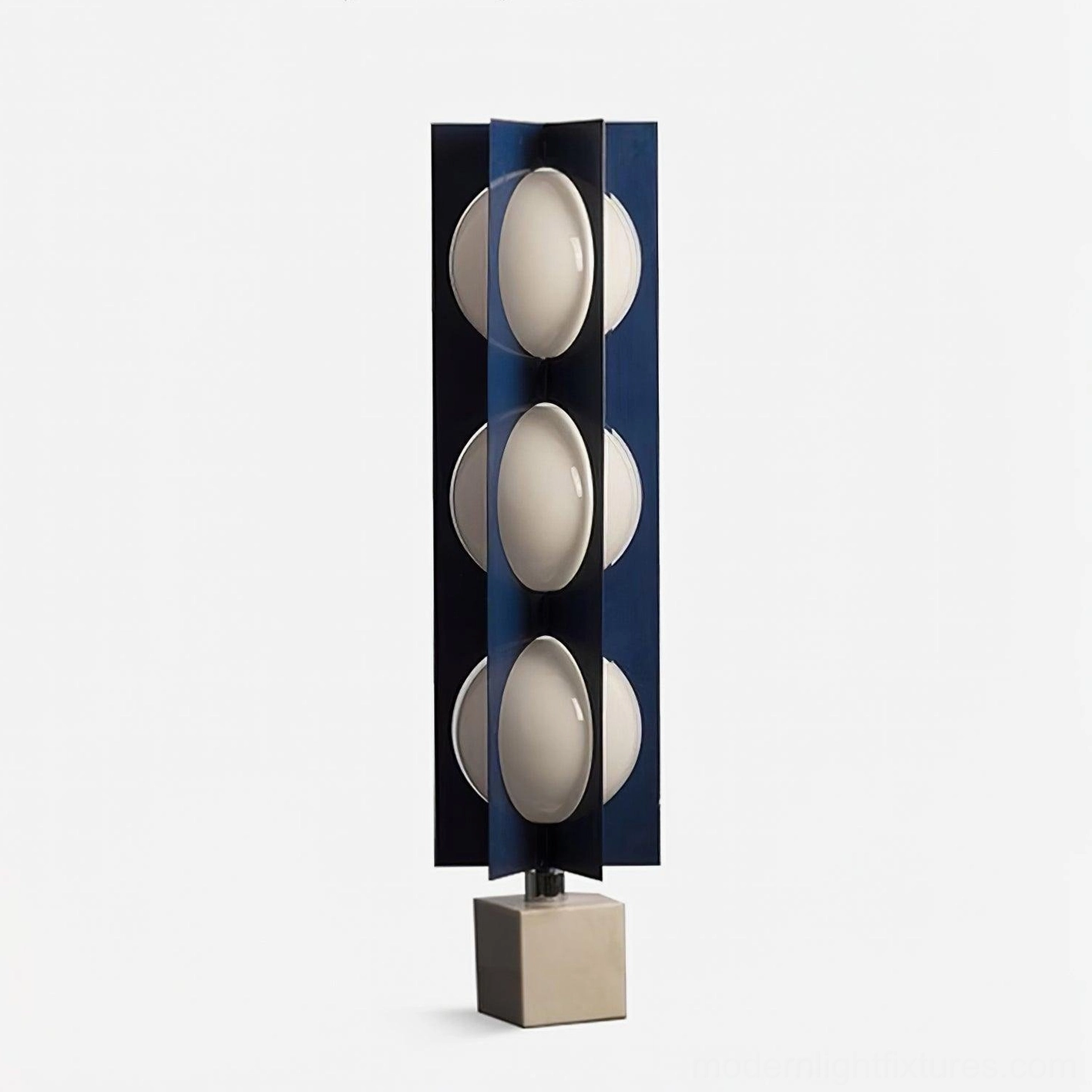Compact 3-head blue glass floor lamp unlit white studio background marble base